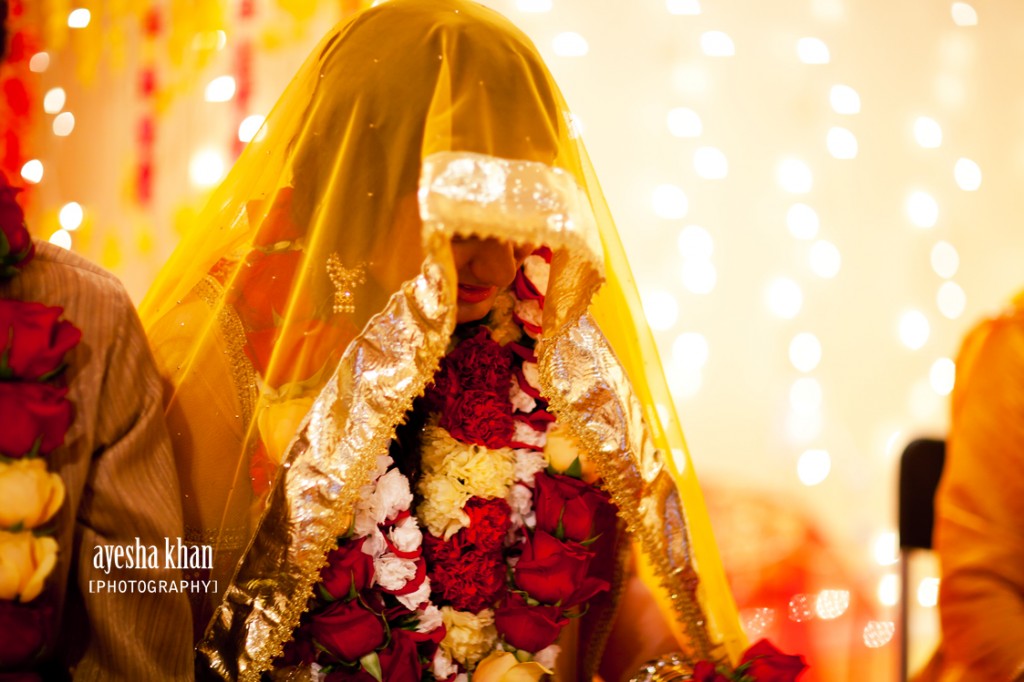 Sana and Shahzeb with lots of flower garlands during the Mayoun Rasms - The Muslim Bride IMG 1392small 1024x682 The Muslim Bride Special Wedding Feature: Sana and Shahzebs Mayoun/Manjha Event